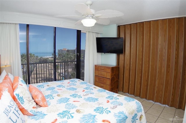 tiled bedroom with ceiling fan