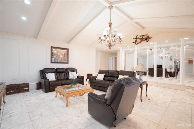 living area featuring ornate columns, vaulted ceiling with beams, an inviting chandelier, and a decorative wall