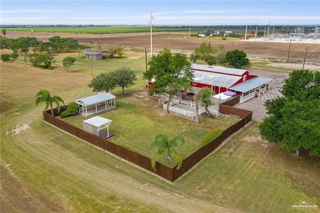 birds eye view of property featuring a rural view