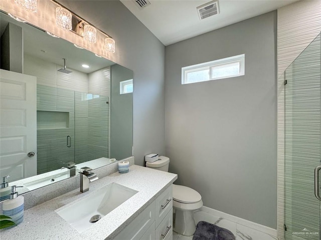 1313 W Dawes Ave W, Alton, TX 78573 - bathroom featuring vanity, toilet, a shower stall, baseboards, and marble finish floors