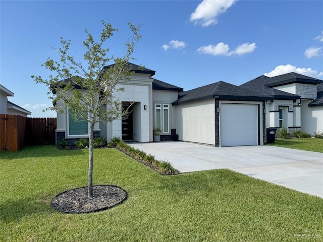 1313 W Dawes Ave W, Alton, TX 78573 - prairie-style home with driveway and a garage