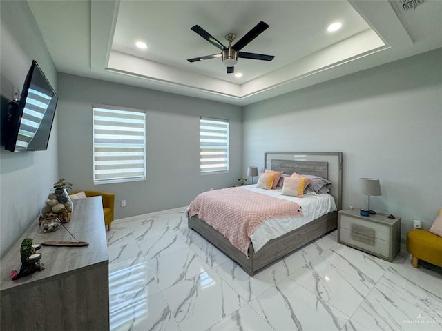 1313 W Dawes Ave W, Alton, TX 78573 - bedroom featuring marble finish floors, a raised ceiling, recessed lighting, and a ceiling fan