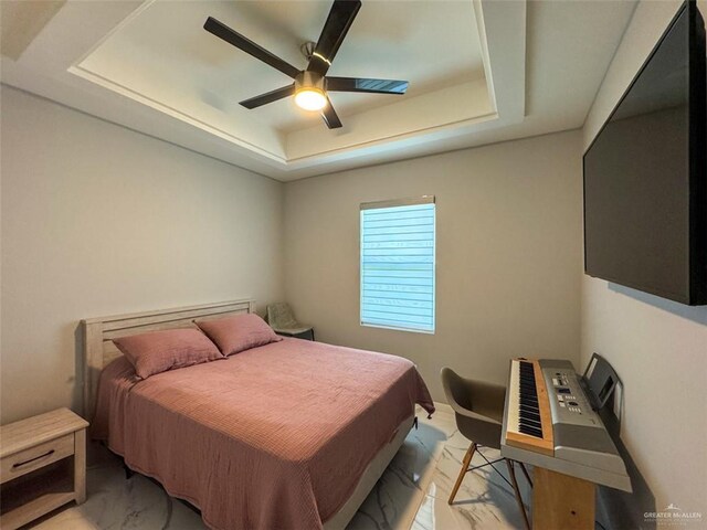 1313 W Dawes Ave W, Alton, TX 78573 - bedroom with a raised ceiling and ceiling fan