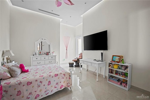 tiled bedroom featuring ceiling fan