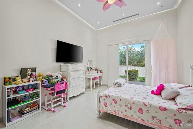 tiled bedroom with crown molding, ceiling fan, a towering ceiling, and access to outside