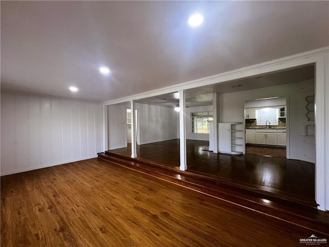 interior space featuring dark hardwood / wood-style floors and sink