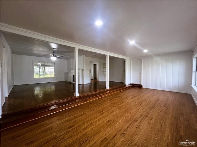 interior space featuring hardwood / wood-style flooring and ceiling fan