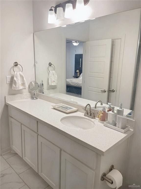 8507 N 33rd Ln N, Mcallen, TX 78504 - ensuite bathroom featuring double vanity and a ceiling fan