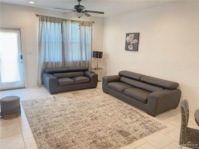 8507 N 33rd Ln N, Mcallen, TX 78504 - living area with tile patterned flooring, a ceiling fan, and healthy amount of natural light