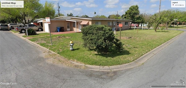 single story home with a front yard