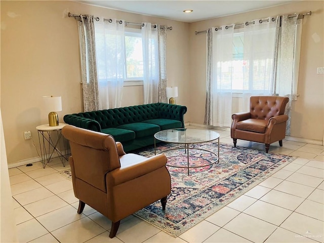 living room with light tile patterned flooring