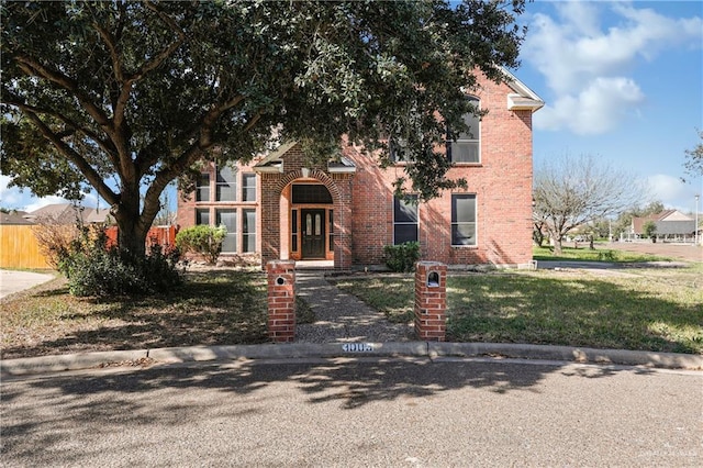 view of front of home with a front lawn