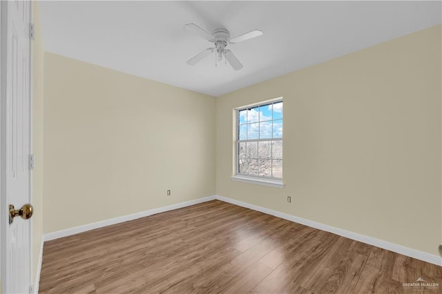 unfurnished room featuring ceiling fan and light hardwood / wood-style flooring