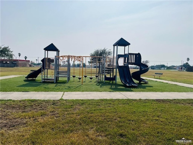 view of jungle gym with a lawn