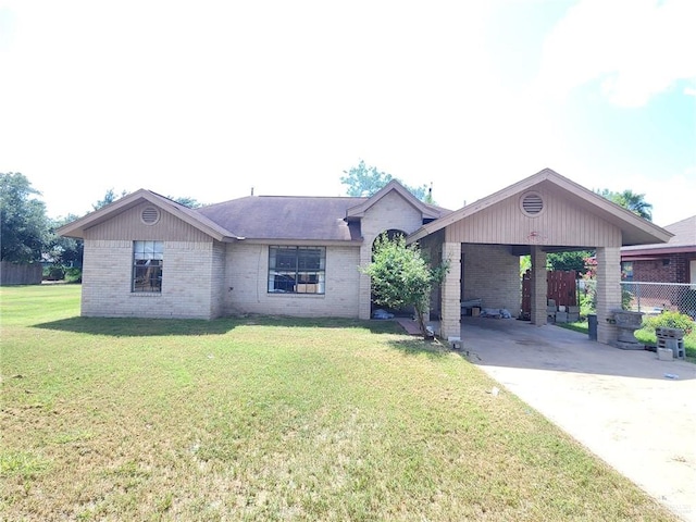 ranch-style house with a front lawn and a carport