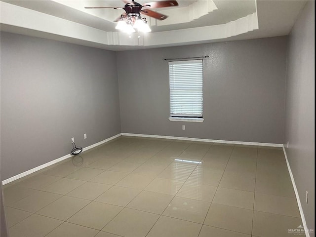 205 Msg Mario A Solis Ln, La Villa, TX 78562 - tiled empty room with a raised ceiling and ceiling fan