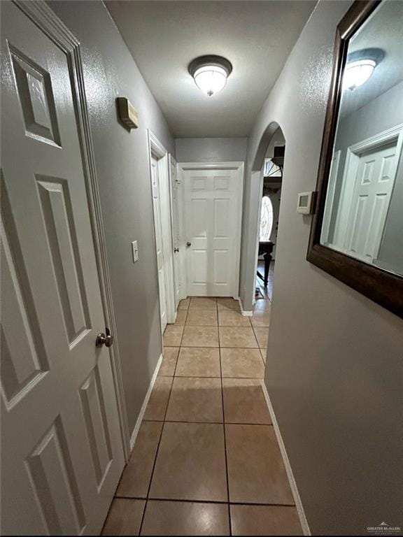 205 Msg Mario A Solis Ln, La Villa, TX 78562 - corridor with light tile patterned floors and arched walkways