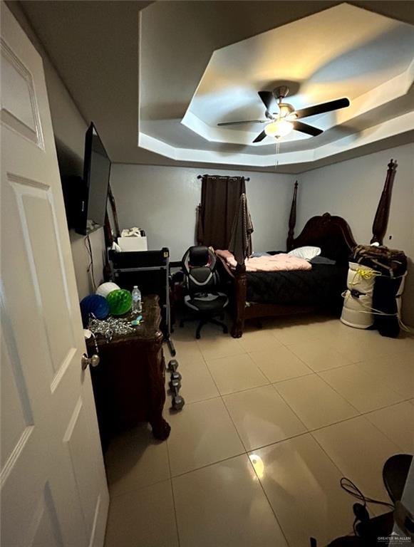 205 Msg Mario A Solis Ln, La Villa, TX 78562 - bedroom featuring a tray ceiling, light tile patterned floors, and ceiling fan