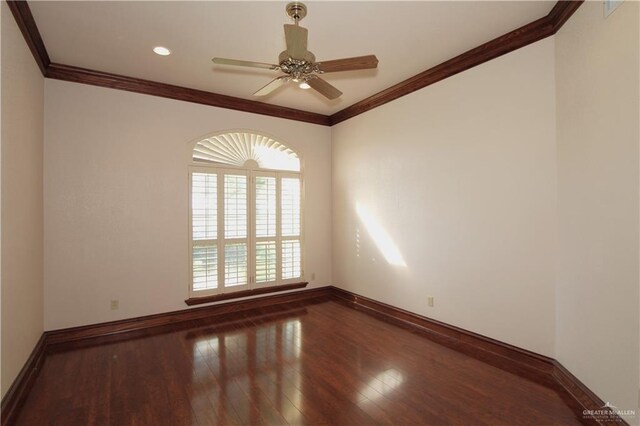 spare room with dark hardwood / wood-style flooring, ceiling fan, and crown molding