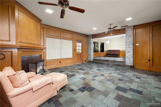 living room featuring ceiling fan