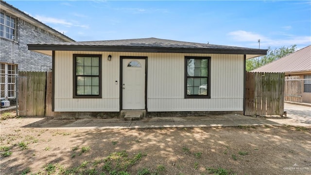 view of front of house with fence