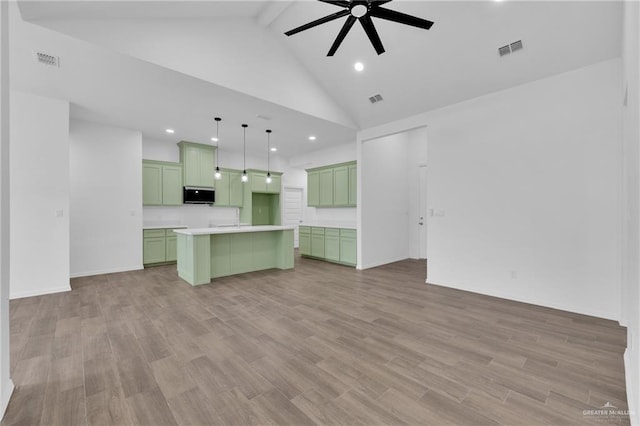 unfurnished living room with light wood-type flooring, high vaulted ceiling, visible vents, and beam ceiling