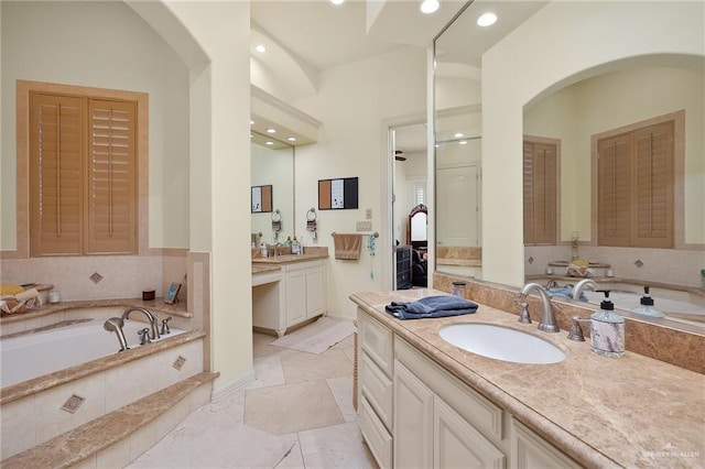 16408 Garrett Rd, Harlingen, TX 78552 - full bath featuring two vanities, a bath, and recessed lighting