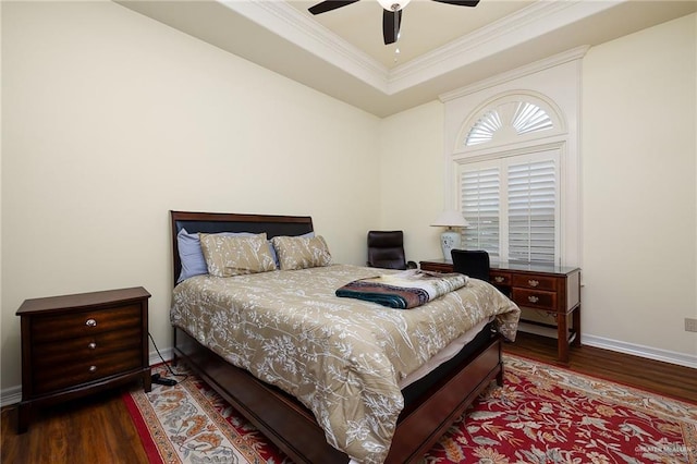 16408 Garrett Rd, Harlingen, TX 78552 - bedroom with wood finished floors, ornamental molding, a tray ceiling, and ceiling fan