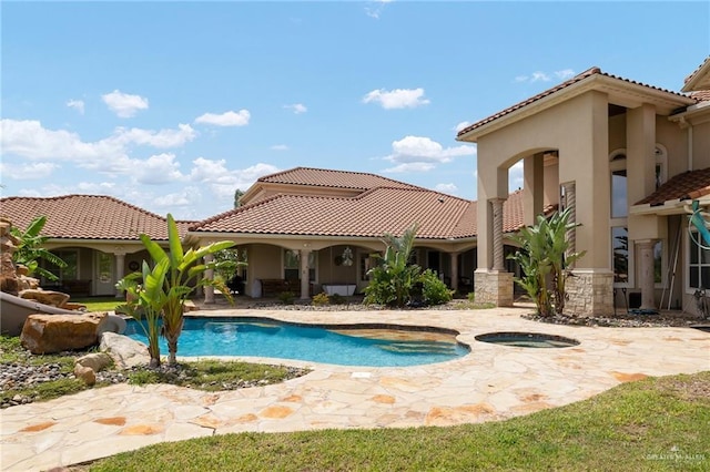 16408 Garrett Rd, Harlingen, TX 78552 - swimming pool with an in-ground hot tub and a patio