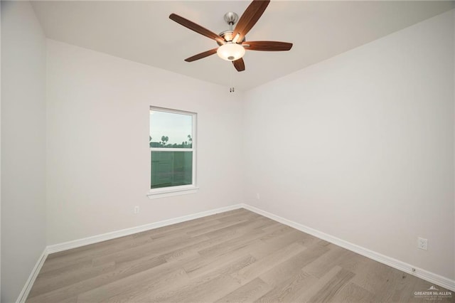 unfurnished room featuring ceiling fan and light hardwood / wood-style flooring