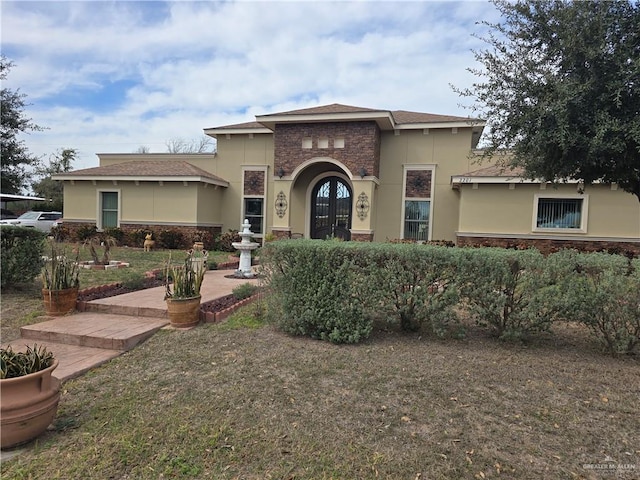 view of front facade featuring french doors