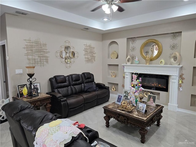 living room featuring ceiling fan