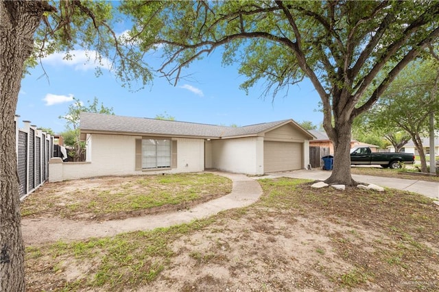 7013 N 14th Ln, Mcallen, TX 78504 - single story home featuring fence, an attached garage, and driveway