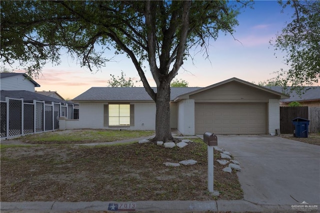 7013 N 14th Ln, Mcallen, TX 78504 - ranch-style home featuring driveway, brick siding, and a garage