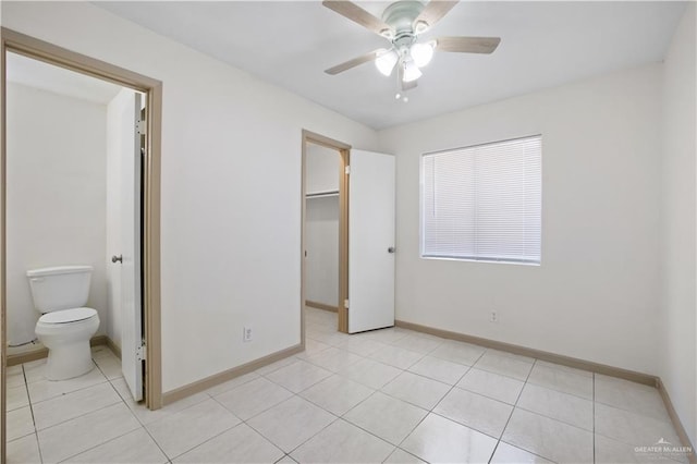 7013 N 14th Ln, Mcallen, TX 78504 - full bathroom featuring baseboards, tile patterned floors, and bathing tub / shower combination