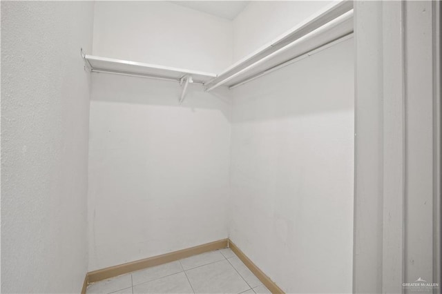 7013 N 14th Ln, Mcallen, TX 78504 - walk in closet featuring light tile patterned flooring
