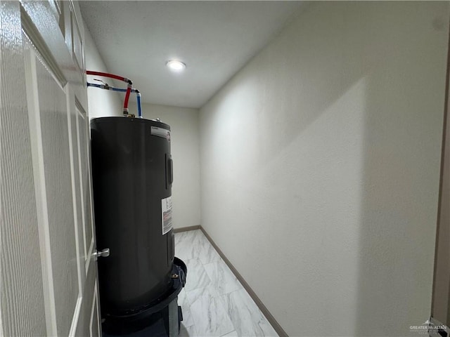 7013 N 14th Ln, Mcallen, TX 78504 - utility room featuring electric water heater