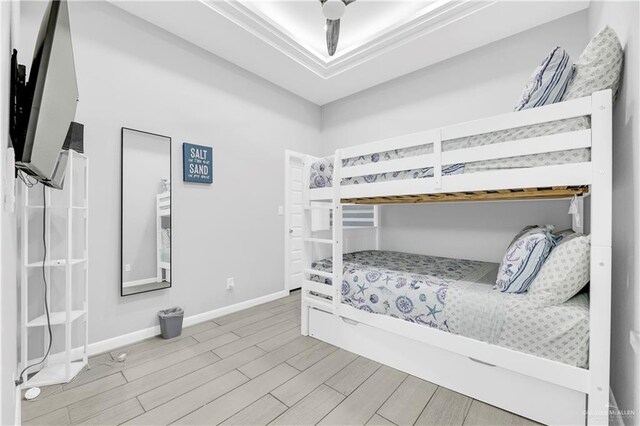 bedroom featuring ceiling fan and light hardwood / wood-style flooring