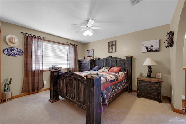 2724 Wildwood Dr, Weslaco, TX 78596 - bedroom featuring light colored carpet, baseboards, and ceiling fan