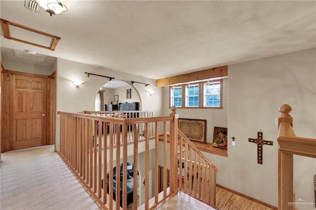 2724 Wildwood Dr, Weslaco, TX 78596 - hallway featuring an upstairs landing and attic access