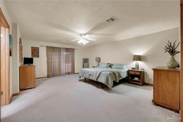 2724 Wildwood Dr, Weslaco, TX 78596 - bedroom with carpet, baseboards, and ceiling fan