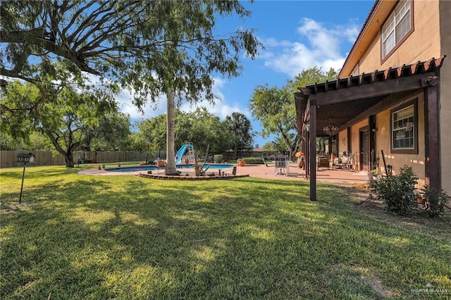 2724 Wildwood Dr, Weslaco, TX 78596 - view of yard with a patio area