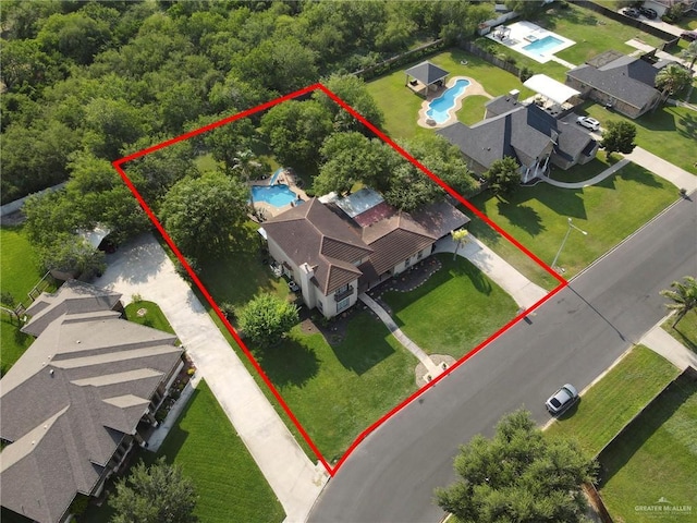 2724 Wildwood Dr, Weslaco, TX 78596 - aerial overview of property's location with a pool and property parcel outlined