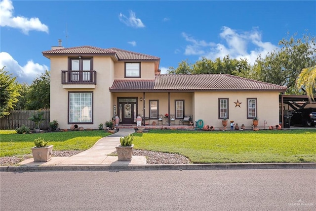 2724 Wildwood Dr, Weslaco, TX 78596 - mediterranean / spanish-style home featuring a porch, stucco siding, a balcony, and a tiled roof