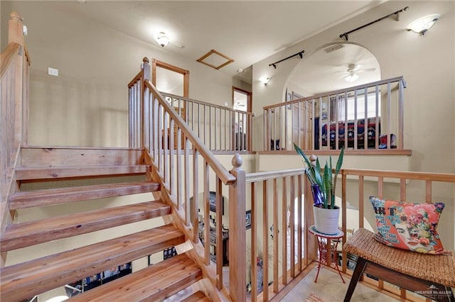 2724 Wildwood Dr, Weslaco, TX 78596 - stairs featuring a ceiling fan