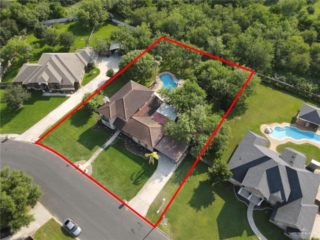 2724 Wildwood Dr, Weslaco, TX 78596 - view of property location with a pool and property boundaries highlighted