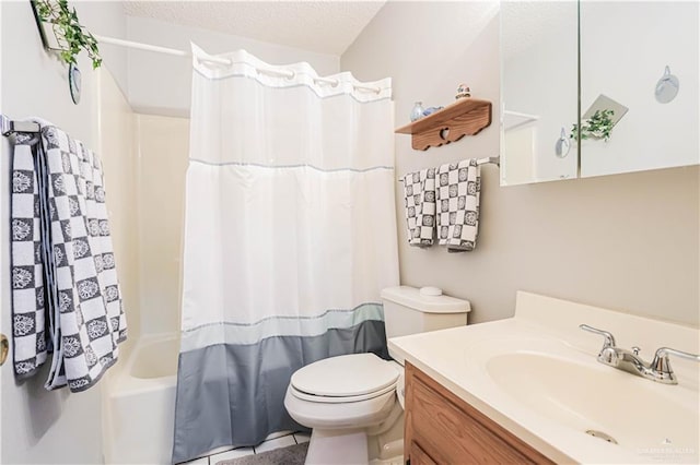 full bathroom featuring shower / bath combo, vanity, a textured ceiling, and toilet