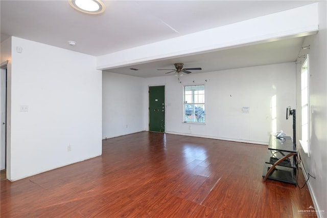 empty room featuring ceiling fan and wood finished floors