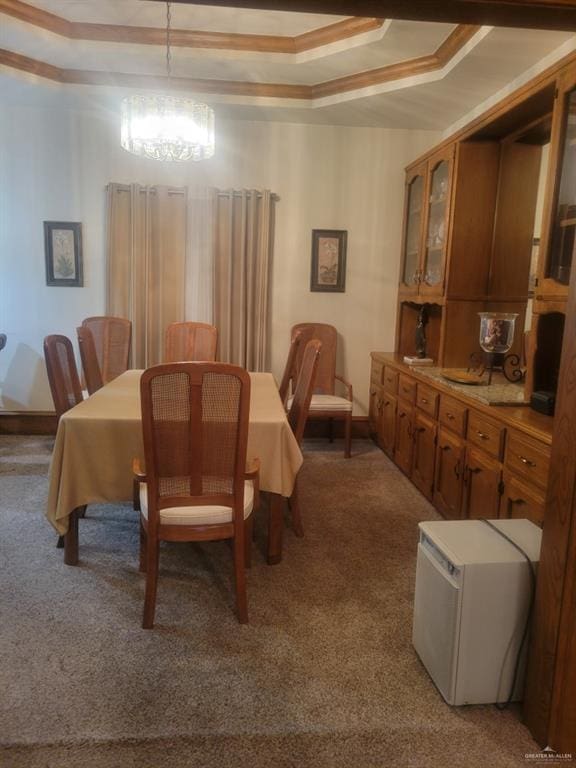 view of carpeted dining area