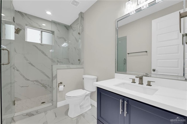 bathroom with toilet, vanity, and walk in shower